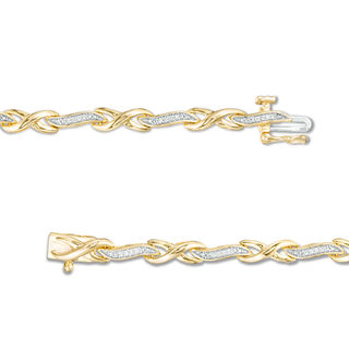 1/8 CT. T.W. Diamond Infinity Wave Link Bracelet in 10K Gold