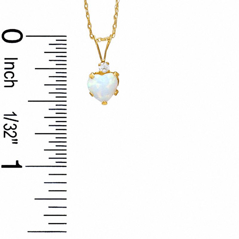 6mm Heart-Shaped Lab-Created Opal Pendant in 10K Gold with CZ