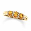 Thumbnail Image 0 of Oval Citrine Three Stone Ring in 10K Gold with Diamond Accents - Size 7