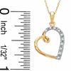 Thumbnail Image 1 of 1/20 CT. T.W. Diamond Tilted Looping Heart Pendant in 10K Gold