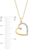 Thumbnail Image 2 of 1/20 CT. T.W. Diamond Tilted Looping Heart Pendant in 10K Gold