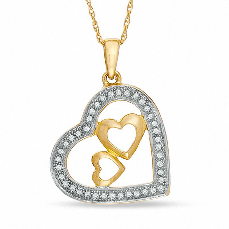 1/10 CT. T.W. Diamond Heart Pendant in 10K Gold - 16"