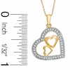Thumbnail Image 1 of 1/10 CT. T.W. Diamond Heart Pendant in 10K Gold - 16"