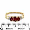 Thumbnail Image 2 of Oval Garnet Three Stone Ring in 10K Gold - Size 7