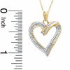 Thumbnail Image 1 of 1/4 CT. T.W. Round and Baguette Diamond Heart Pendant in 10K Gold