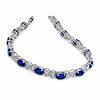 Thumbnail Image 1 of Oval Lab-Created Blue Sapphire and Diamond Bracelet in Sterling Silver - 7.25"