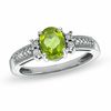 Thumbnail Image 0 of Oval Peridot and Diamond Accent Ring in Sterling Silver - Size 7