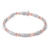 Thumbnail Image 0 of Diamond Accent Hearts Bracelet in Sterling Silver and 10K Rose Gold Plate - 7.25"