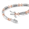 Thumbnail Image 1 of Diamond Accent Hearts Bracelet in Sterling Silver and 10K Rose Gold Plate - 7.25"