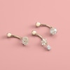 Thumbnail Image 1 of 10K Solid Gold CZ Flower Burst Belly Button Ring - 14G 3/8"