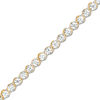 Thumbnail Image 0 of 1/20 CT. T.W. Diamond Tennis Bracelet in Sterling Silver and 10K Gold Plate - 7.25"