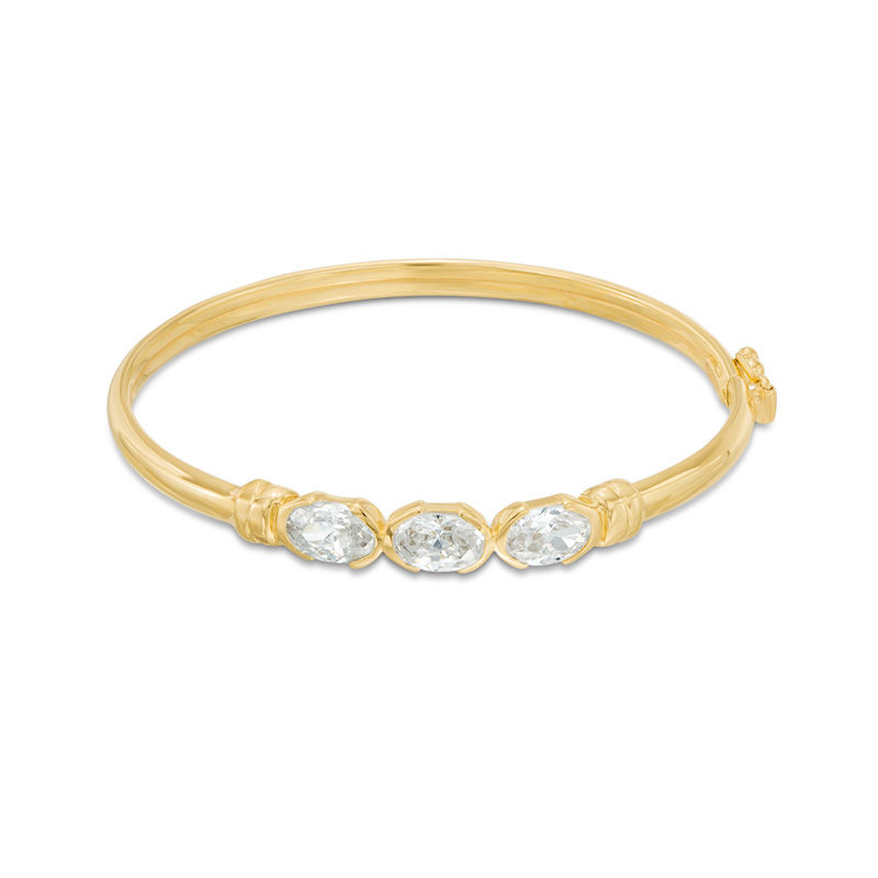 Child's Oval Cubic Zirconia Three Stone Bangle in 10K Gold - 4.5"