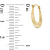 Thumbnail Image 1 of Diamond-Cut Oval Hoop Earrings in 10K Stamp Hollow Gold
