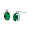 Thumbnail Image 0 of Oval Green Quartz Doublet and Diamond Accent Stud Earrings in Sterling Silver
