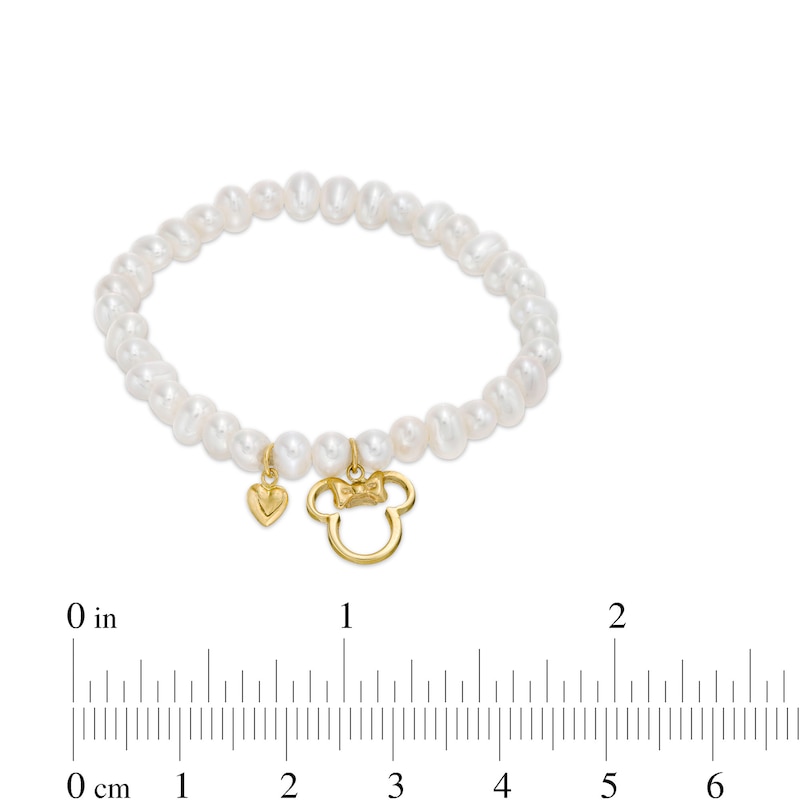 Child's Cultured Freshwater Pearl Stretch Bracelet with ©Disney Minnie Mouse and Heart Charms in 10K Gold -  4.75"