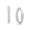 Thumbnail Image 0 of 1/10 CT. T.W. Diamond Huggie Hoop Earrings in Sterling Silver